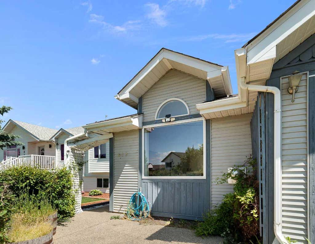 Photo of 412 9 Street, Beiseker, AB T0M 0G0 (MLS # A2326703)