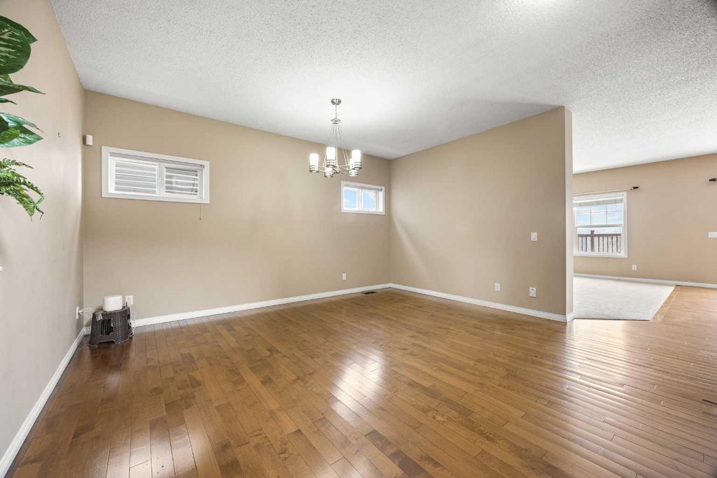 Photo of 65 Panora Way NW, Calgary, AB T3K 0R4 (MLS # A2290161)