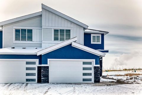 Photo of 122 Waterstone Way, Chestermere, AB T1X 2Z1 (MLS # A2297783)
