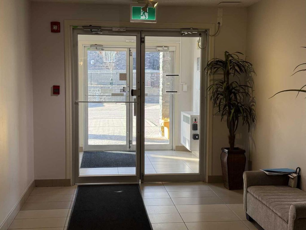 Photo of 175 Panatella Hill NW #1403, Calgary, AB T3K 0V9 (MLS # A2286350)