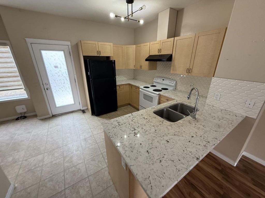 Photo of 111 Tarawood Lane NE #204, Calgary, AB T3J 0C1 (MLS # A2304955)