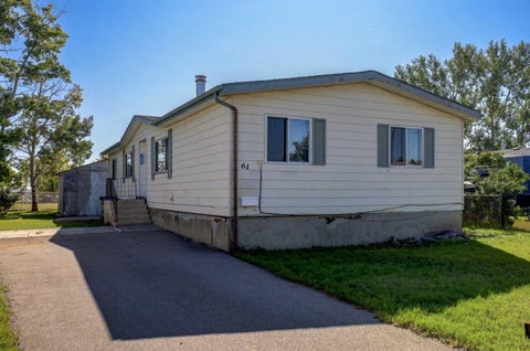 Photo of 61 Huntstrom Drive NE, Calgary, AB T2K 5V5 (MLS # A2345587)