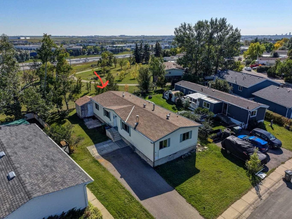 Photo of 61 Huntstrom Drive NE, Calgary, AB T2K 5V5 (MLS # A2345587)