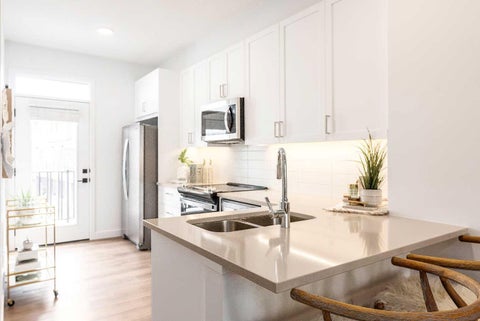 Photo of 272 Heirloom Crescent SE #106, Calgary, AB T3S 1H2 (MLS # A2344062)