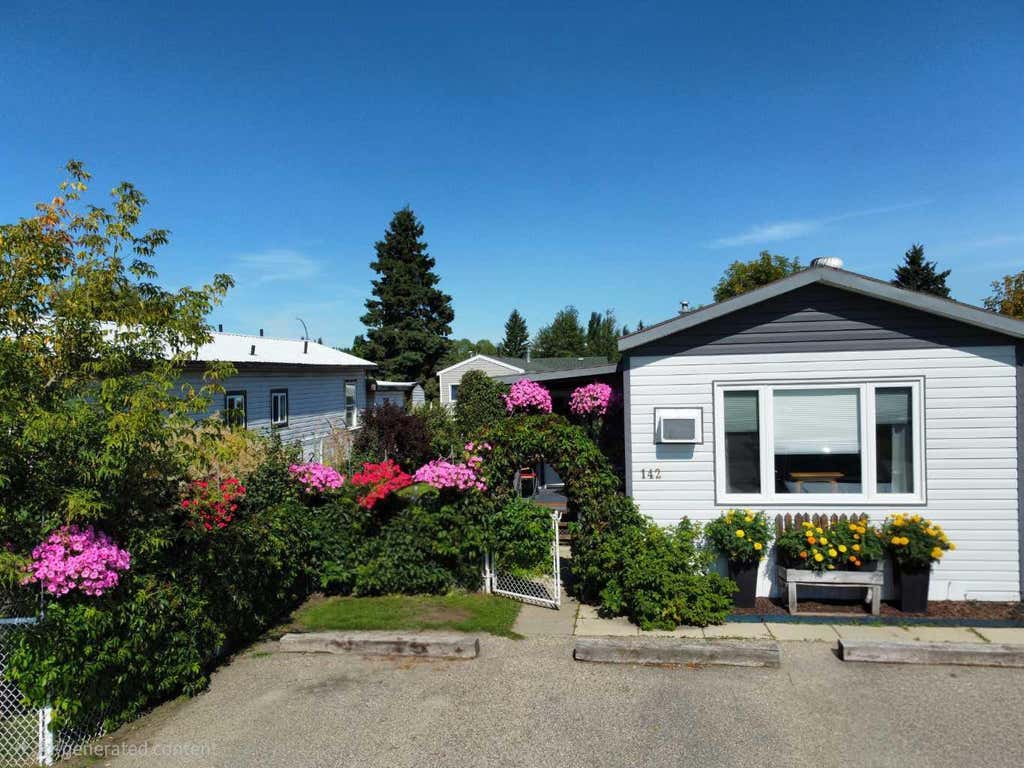 Photo of 142 Rivervalley Estates Est, Whitecourt, AB T7S 1K1 (MLS # A2339630)