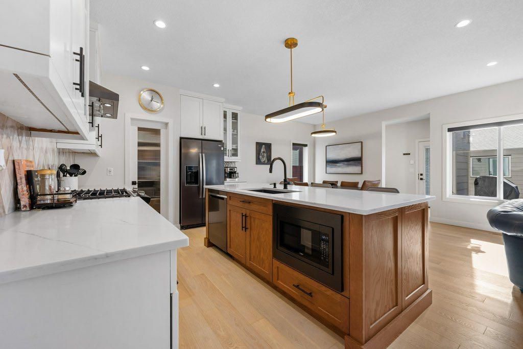 Photo of 409 Shawnee Boulevard SW, Calgary, AB T2Y 0T4 (MLS # A2263453)