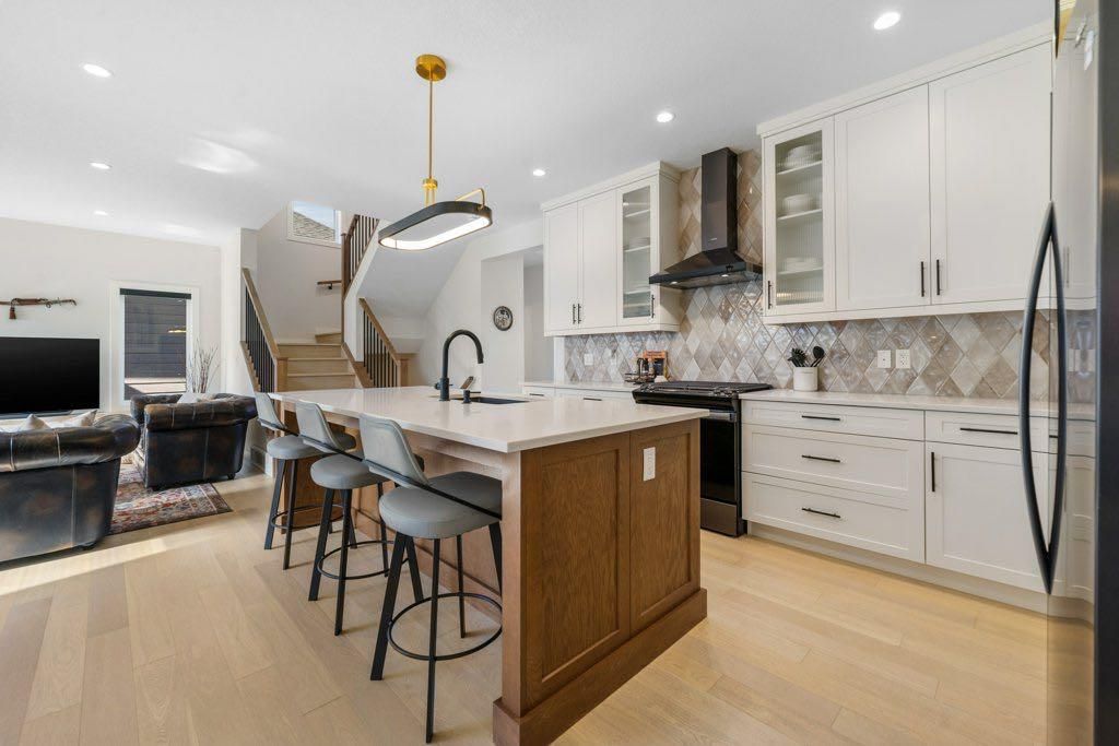 Photo of 409 Shawnee Boulevard SW, Calgary, AB T2Y 0T4 (MLS # A2263453)
