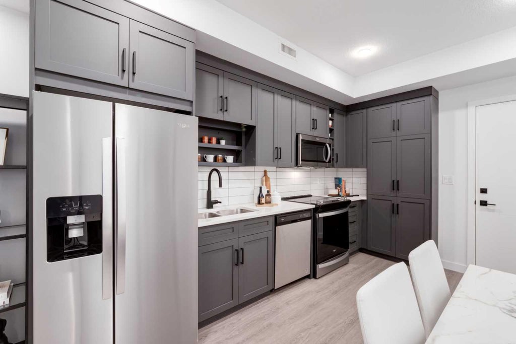 Photo of 3107 Warren Street NW #404, Calgary, AB T3B 6N7 (MLS # A2351792)