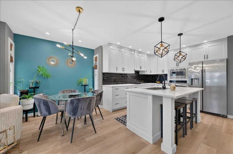 Photo of 33 Stonegate Drive NW #23, Airdrie, AB T4B 2V9 (MLS # A2329160)