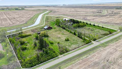 Photo of 222075 RANGE ROAD 264, Rural Wheatland County, AB T0J 0M0 (MLS # A2306232)