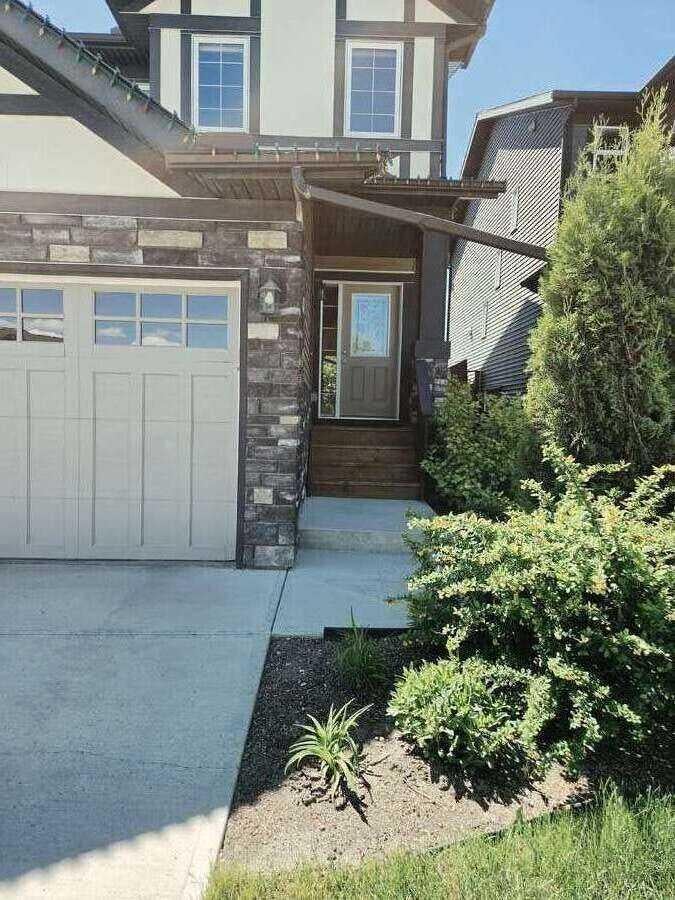 Photo of 1346 Kings Heights Way SE, Airdrie, AB T4A 0R9 (MLS # A2323731)