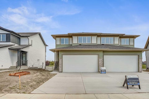 Photo of 341 Dawson Wharf Road, Chestermere, AB T1X 2W4 (MLS # A2342940)