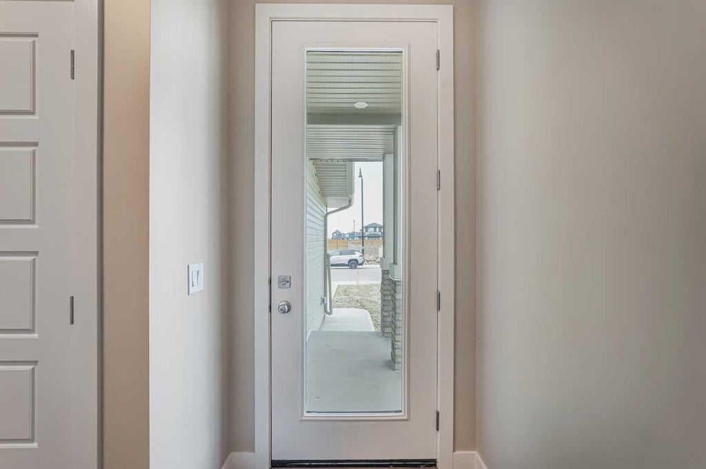 Photo of 341 Dawson Wharf Road, Chestermere, AB T1X 2W4 (MLS # A2342940)