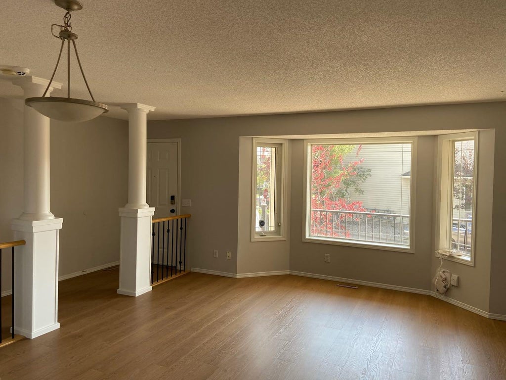 Photo of 950 Arbour Lake Road NW #102, Calgary, AB T3G 5B3 (MLS # A2338799)