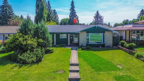 Photo of 1027 Lake Sylvan Drive SE, Calgary, AB T2J 2P9 (MLS # A2339314)