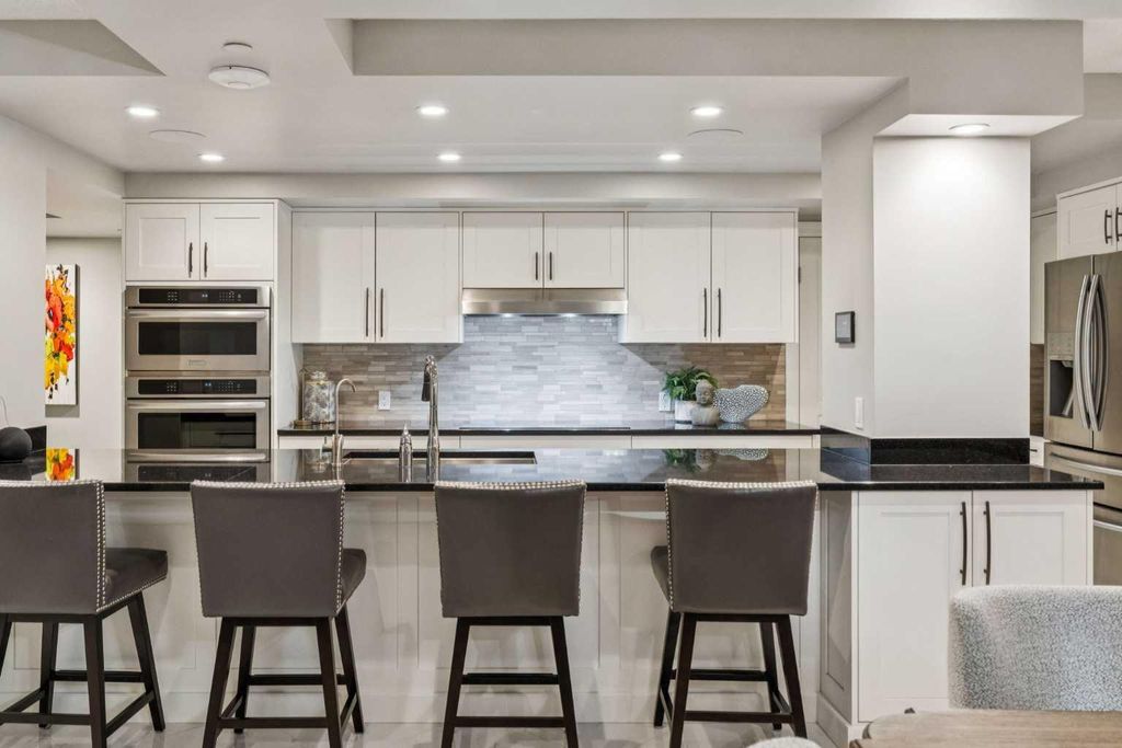 Photo of 400 Eau Claire Avenue SW #8203, Calgary, AB T2P 4X2 (MLS # A2304230)