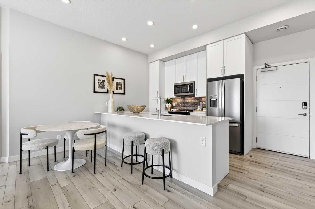 Photo of 255 Les Jardins Park SE #423, Calgary, AB T2C 5W9 (MLS # A2286118)