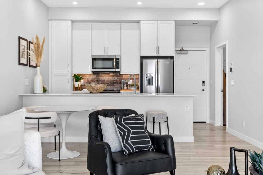Photo of 255 Les Jardins Park SE #423, Calgary, AB T2C 5W9 (MLS # A2286118)