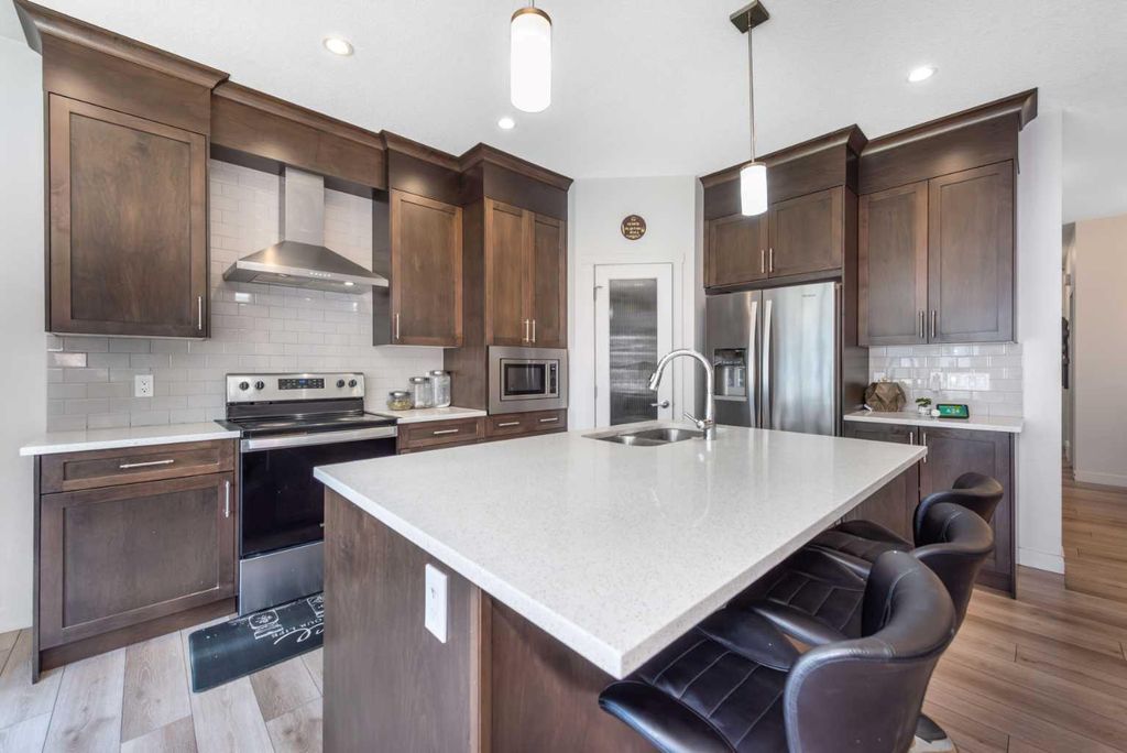 Photo of 32 Saddlestone Way NE, Calgary, AB T3J 2C9 (MLS # A2313851)