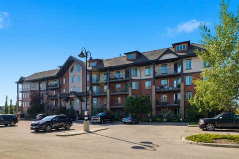 Photo of 15 Sunset Square #2208, Cochrane, AB T4C 0E7 (MLS # A2332094)