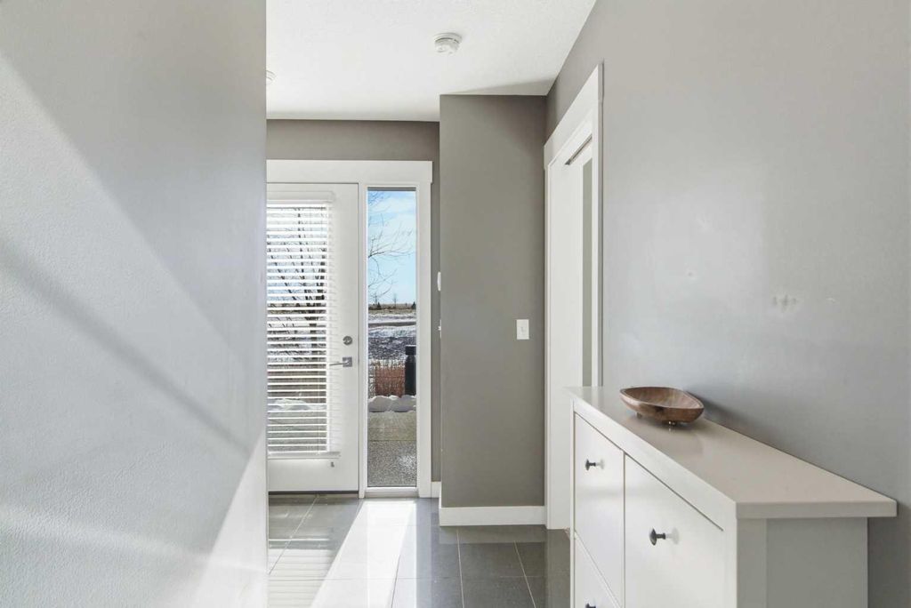 Photo of 111 Rainbow Falls Gate #33, Chestermere, AB T1X 0Z5 (MLS # A2289405)