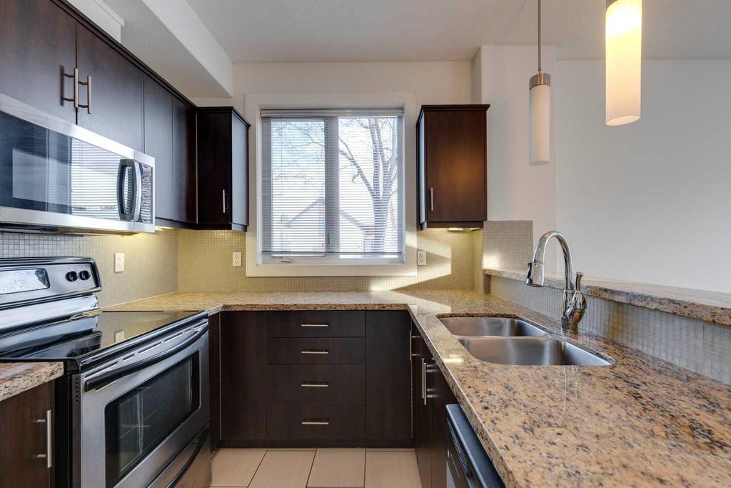 Photo of 320 12 Avenue NE #101, Calgary, AB T2E 1A4 (MLS # A2292424)