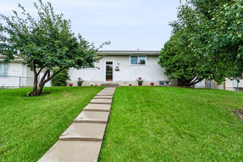 Photo of 1012 Raynard Crescent SE, Calgary, AB T2A 1X9 (MLS # A2344829)