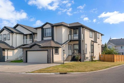Photo of 202 Coral Reef Manor NE, Calgary, AB T3J 3Y7 (MLS # A2289045)