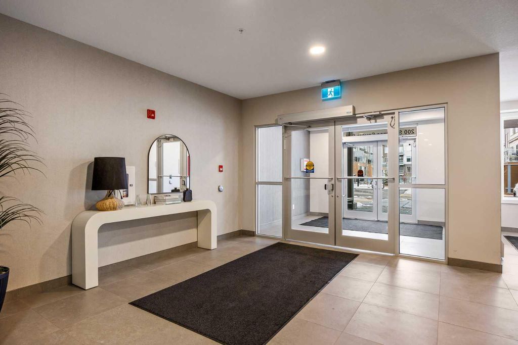 Photo of 200 Shawnee Square SW #101, Calgary, AB T2Y 0T7 (MLS # A2301944)