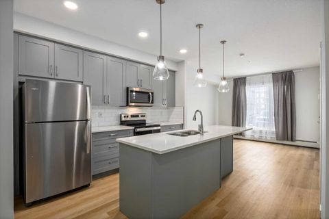 Photo of 200 Shawnee Square SW #101, Calgary, AB T2Y 0T7 (MLS # A2301944)