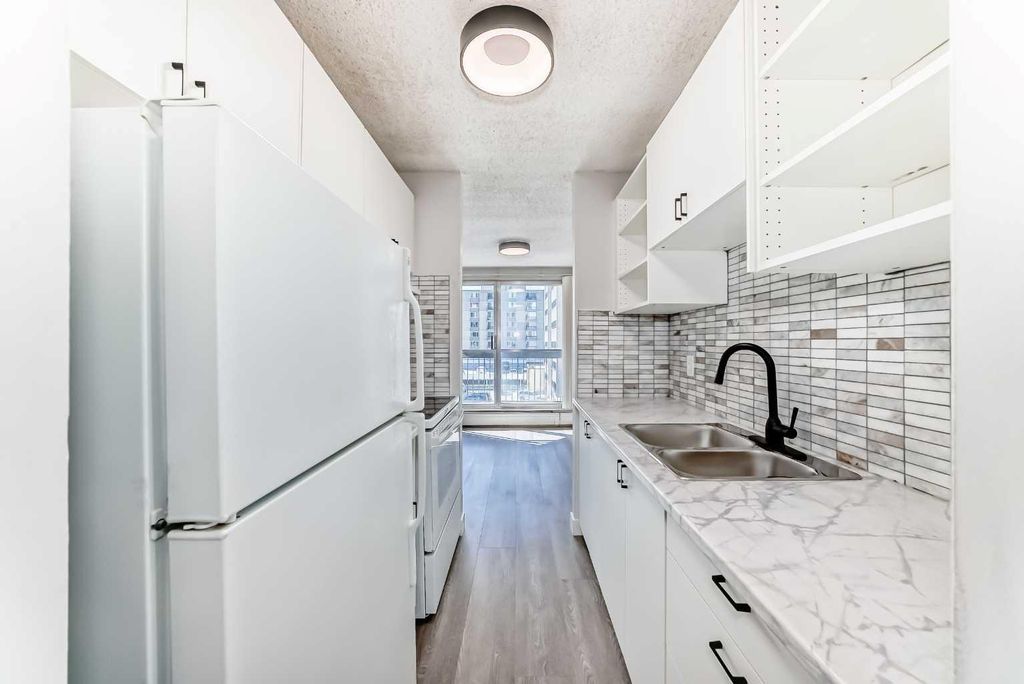 Photo of 340 14 Avenue SW #401, Calgary, AB T2R 1H4 (MLS # A2301349)