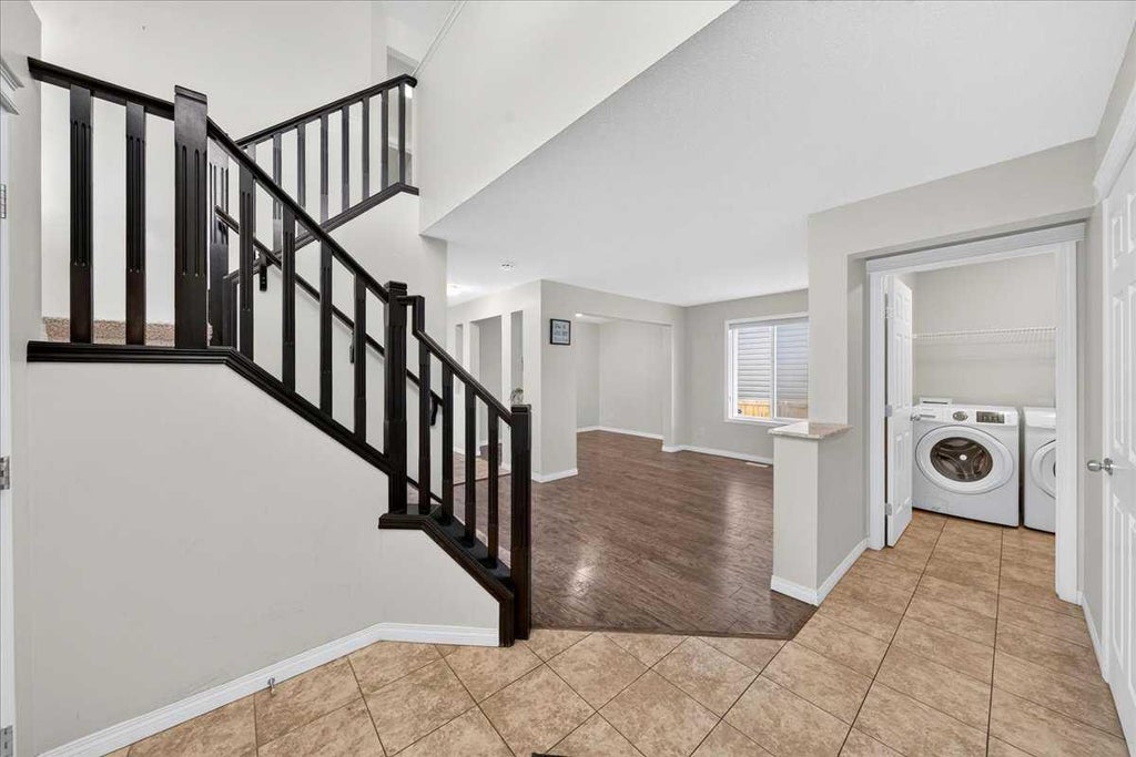 Photo of 117 Panora Way NW, Calgary, AB T3K 0R4 (MLS # A2351873)