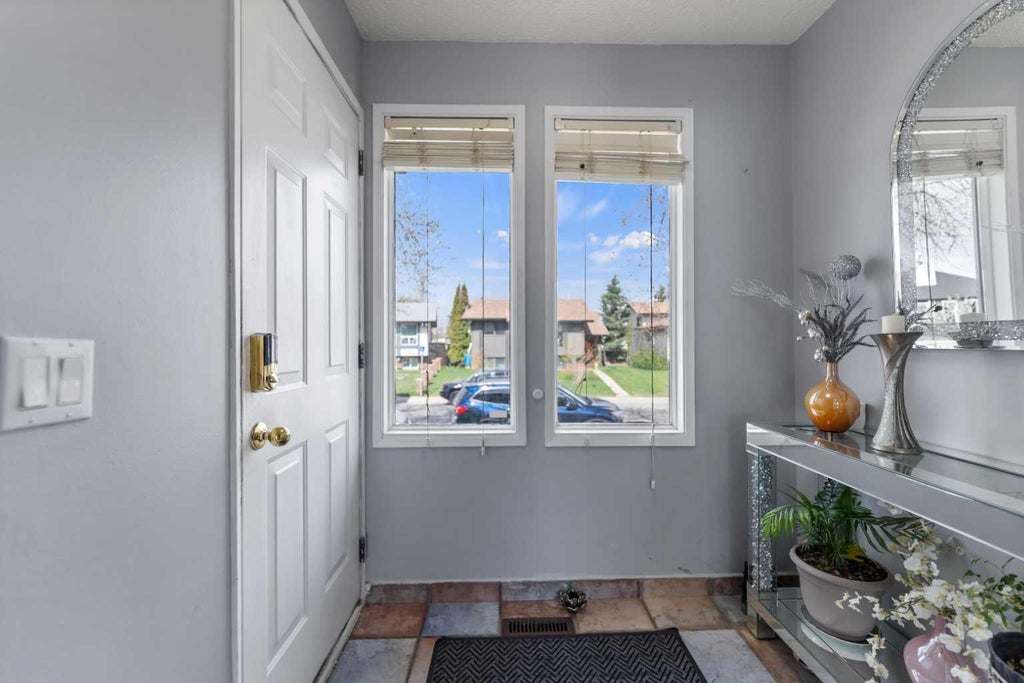 Photo of 35 Templemont Drive NE, Calgary, AB T1Y 4Z5 (MLS # A2344822)