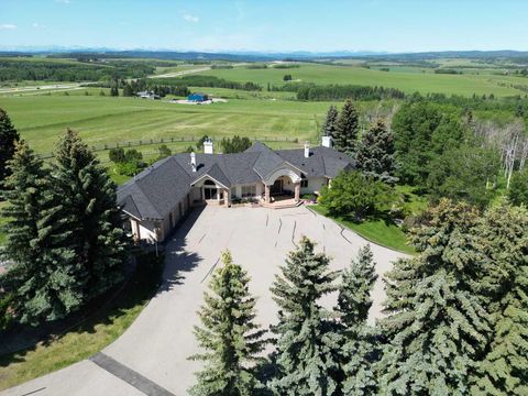 182029 174 Avenue W 100 Priddis AB T1S 2B8