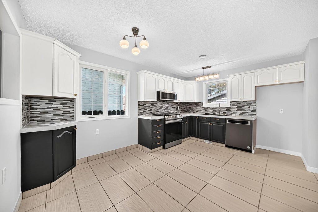 Photo of 16 Dovely Way SE, Calgary, AB T2B 2K8 (MLS # A2344963)