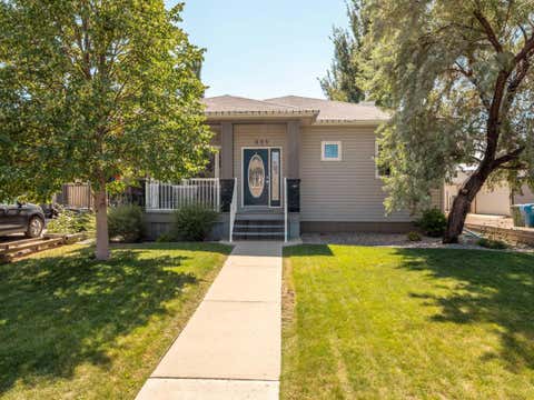 Photo of 695 Parkside Drive, Coaldale, AB T1M 1R7 (MLS # A2333222)