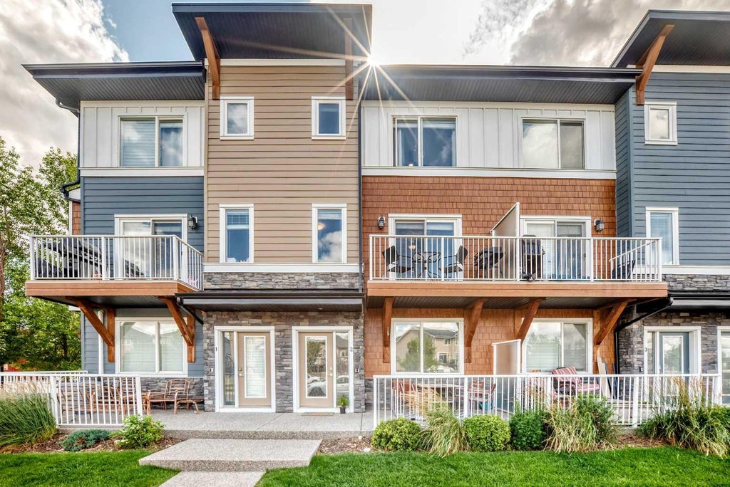 Photo of 111 Rainbow Falls Gate #2, Chestermere, AB T1X 0Z4 (MLS # A2338372)