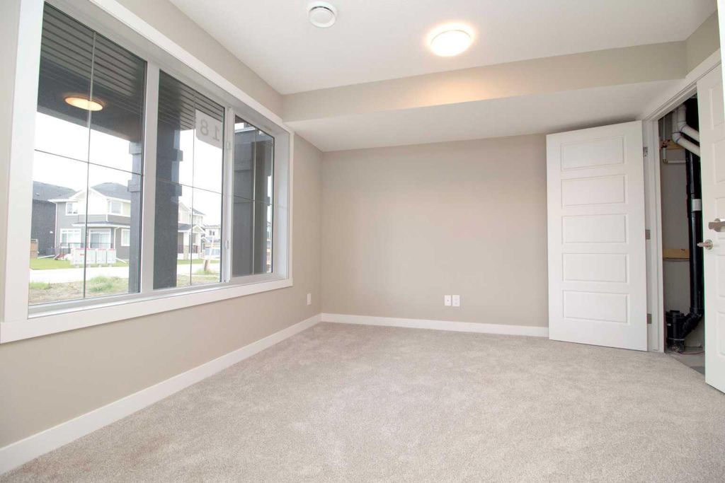 Photo of 18 Sundown Place, Cochrane, AB T4C 3H2 (MLS # A2324935)