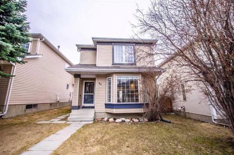 Photo of 84 Hidden Green NW, Calgary, AB T3A 5K7 (MLS # A2296267)