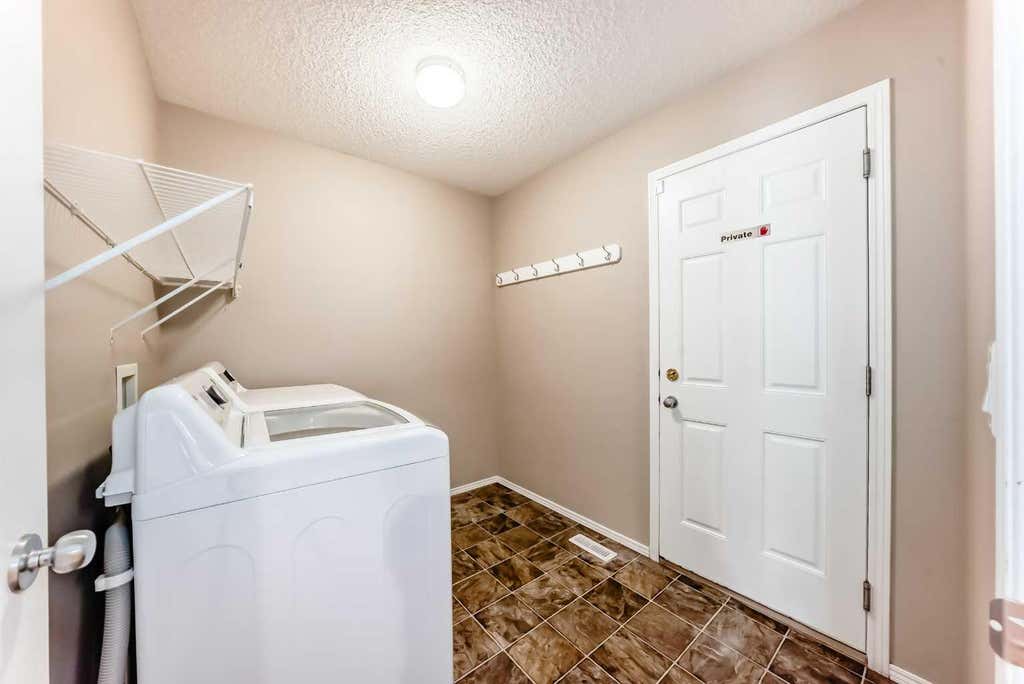 Photo of 80 Eversyde Way SW, Calgary, AB T2Y 4V5 (MLS # A2333529)