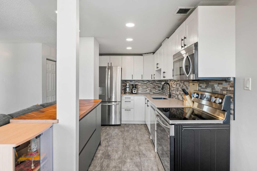 Photo of 1334 14 Avenue SW #505, Calgary, AB T3C 0W2 (MLS # A2336517)