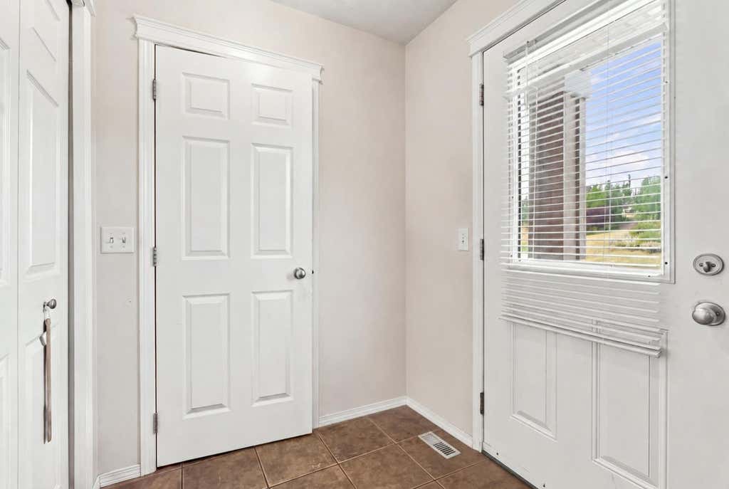 Photo of 106 Panamount Drive NW, Calgary, AB T3K 6K3 (MLS # A2338019)