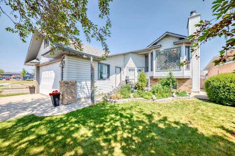 Photo of 68 Harvest Oak Way NE, Calgary, AB T3K 3Y2 (MLS # A2339457)