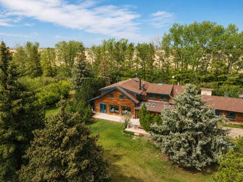 Photo of 261074 Township Road 262, Rural Rocky View County, AB T0M 1G0 (MLS # A2315019)