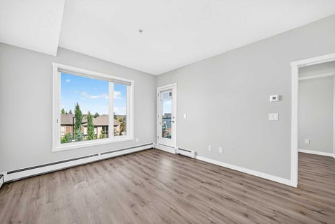Tiny photo for 71 SHAWNEE Common SW #205, Calgary, AB T2Y 0R2 (MLS # A2345208)