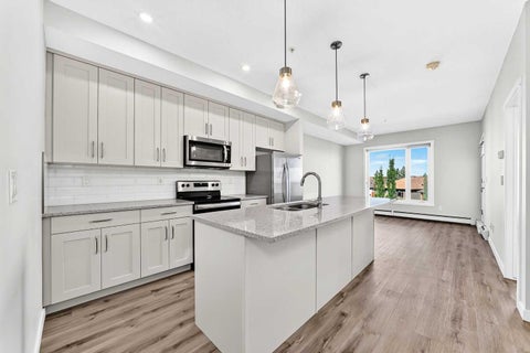 Photo of 71 SHAWNEE Common SW #205, Calgary, AB T2Y 0R2 (MLS # A2345208)