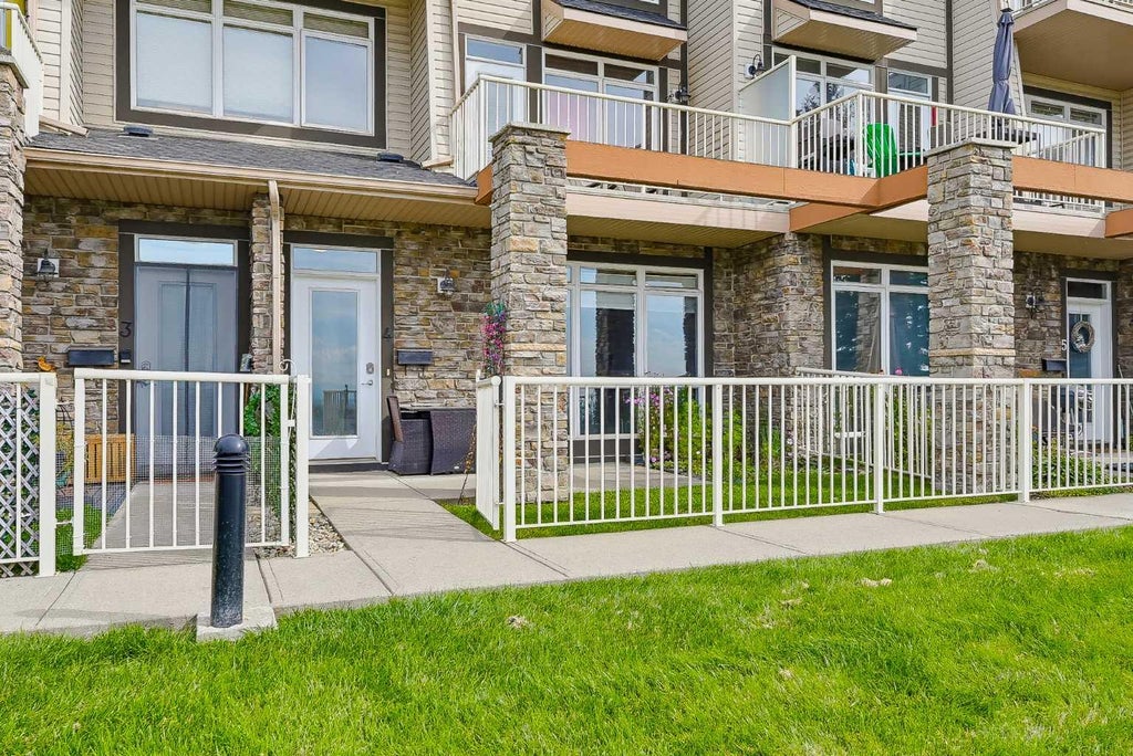 Photo of 117 Rockyledge View NW #4, Calgary, AB T3G 5X1 (MLS # A2348081)
