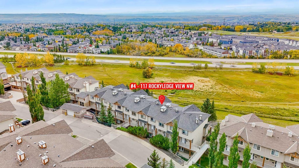 Photo of 117 Rockyledge View NW #4, Calgary, AB T3G 5X1 (MLS # A2348081)
