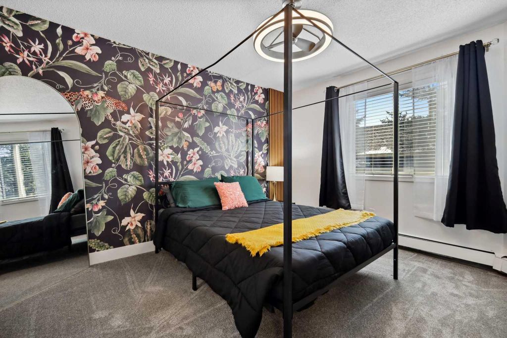 Photo of 10 Sierra Morena Mews SW #210, Calgary, AB T3H 3K5 (MLS # A2291844)