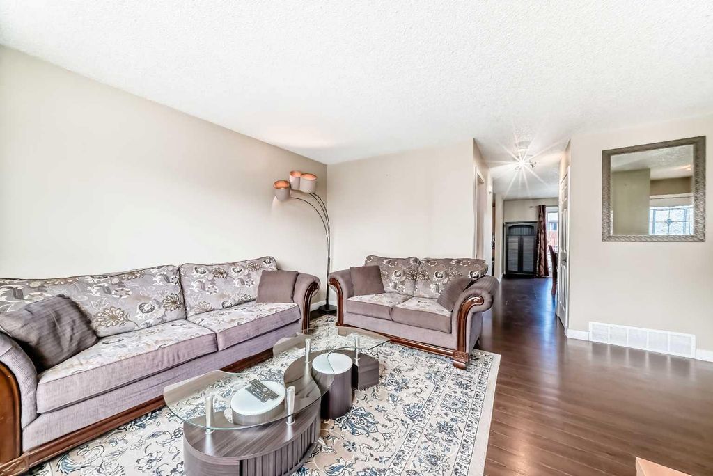 Photo of 148 Pinemill Mews NE, Calgary, AB T1Y 4R6 (MLS # A2312325)